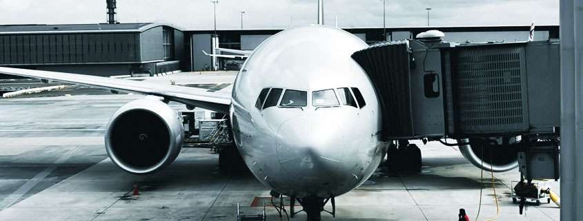 Air-France-Boeing-777-at-Airport-Gate-With-Passenger-Boarding-Bridge Air France Boeing 777 parked at an airport gate with the passenger boarding bridge still connected before pushback