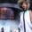 Fashion model wearing an unconventional outfit with an elaborate hairstyle, showcasing experimental fashion and creative styling
