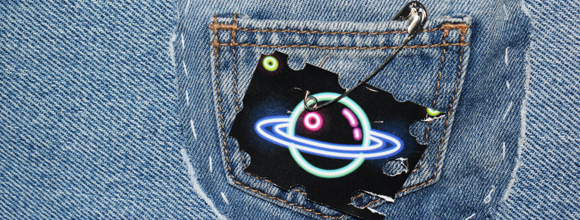 Blue-Jeans-Back-Pocket-Cosmos-Universe-Concept Blue denim jeans back pocket featuring a creative representation of the cosmos, symbolizing the universe within everyday reach