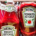 Multiple Heinz tomato ketchup bottles displaying their recognizable red ketchup and classic branded labels