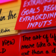 Collection of sticky notes arranged closely together displaying inspirational quotes, philosophical reflections, and motivational messages