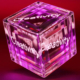 Three-dimensional cube featuring the word Creativity on each visible side