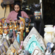 Egyptian souvenir shop displaying miniature pyramids, ancient Egyptian deity figurines, black cat statues, and decorative keepsakes