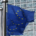 Multiple European Union flags displayed together featuring the blue background and circle of twelve gold stars