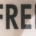 Sign displaying the word FREE, representing promotional offers, zero-cost products, and consumer marketing strategies