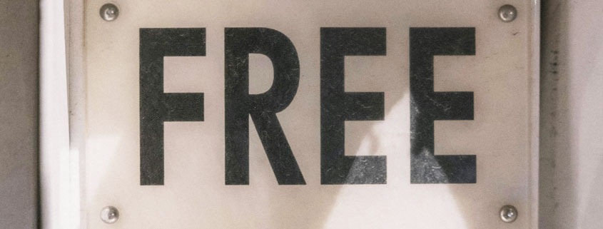 Sign displaying the word FREE, representing promotional offers, zero-cost products, and consumer marketing strategies