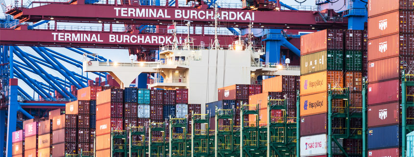 Commercial port terminal in Hamburg, Germany, representing international maritime shipping and global trade