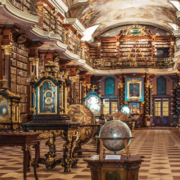 Historic library in Prague featuring ornate eighteenth-century architecture and a traditional interior dedicated to books, science, geometry, and astronomy