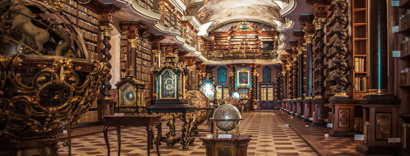 Historic-Prague-Library-Baroque-Architecture-Science-and-Astronomy Historic library in Prague featuring ornate eighteenth-century architecture and a traditional interior dedicated to books, science, geometry, and astronomy