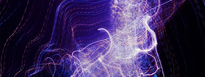 Purple-toned anatomical illustration depicting the human nervous system and its network of internal nerves