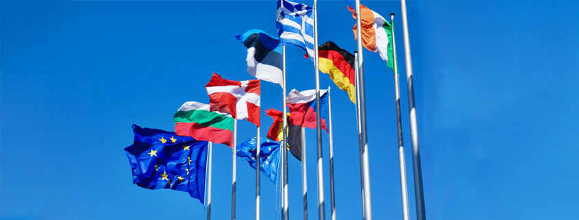 International-Country-Flags-Representing-Global-Cooperation Collection of international flags from different countries displayed together, representing nations around the world