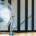 Large floor fan running in a clean and tidy indoor room to circulate air throughout the space