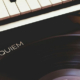 Mozart Requiem vinyl record displayed beside a piano, representing classical music and the emotional power of sound and silence
