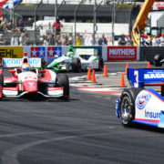 Number two racing car competing at a Grand Prix motorsport event