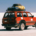 Red Toyota truck on the Salar de Uyuni salt flats in Bolivia with travel equipment secured to its roof