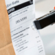 Uber Eats delivery receipt attached to a food order bag for identification and delivery