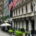 Wall Street financial district in New York City with American flags displayed among the buildings