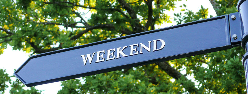 Weekend-Directional-Sign-Pointing-Right Directional sign displaying the word Weekend with an arrow pointing to the right