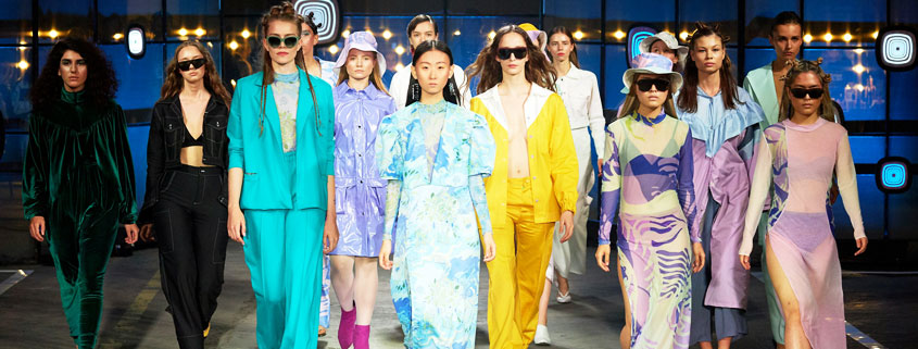 Women-Walking-Together-in-Different-Fashion-Styles-and-Dresses Group of women walking forward in a variety of fashionable dresses and outfits, each expressing a different personal style