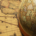 Globe representing planet Earth positioned on top of a geographic world map, illustrating different perspectives of global geography