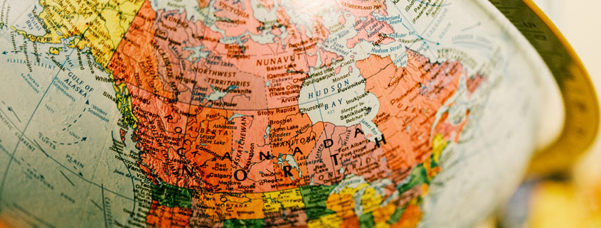 World-Globe-Showing-Canada-and-North-America Geographic globe displaying Canada and the surrounding regions of North America on a detailed world map